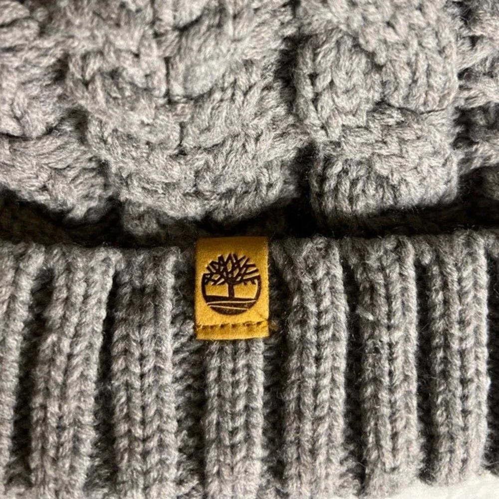 Timberland Women`s Cable Knit Cuff Pom Beanie  Fleece lined Color Gray